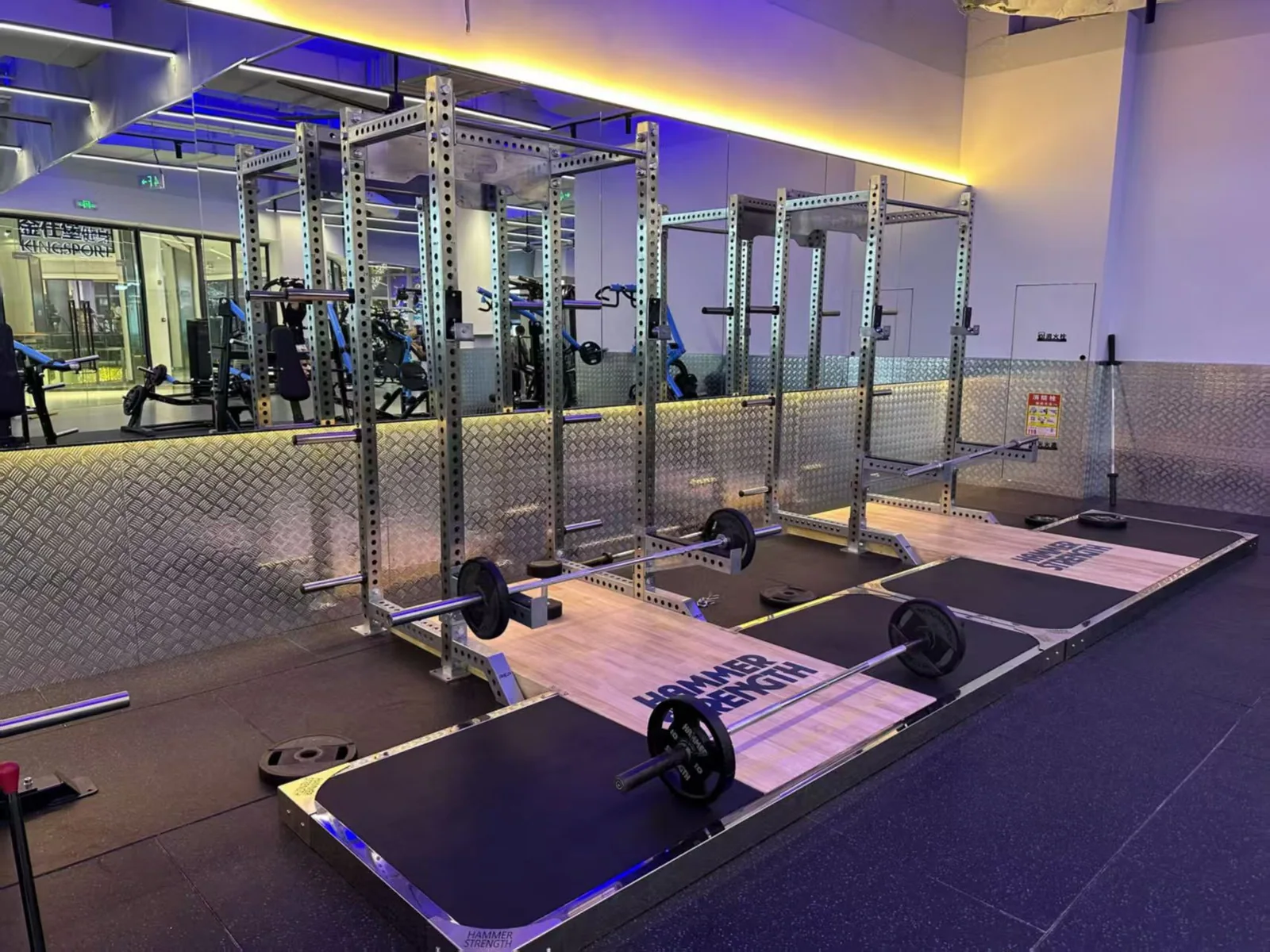 A Rack-Led Free-Weight Zone for a Private Strength Studio